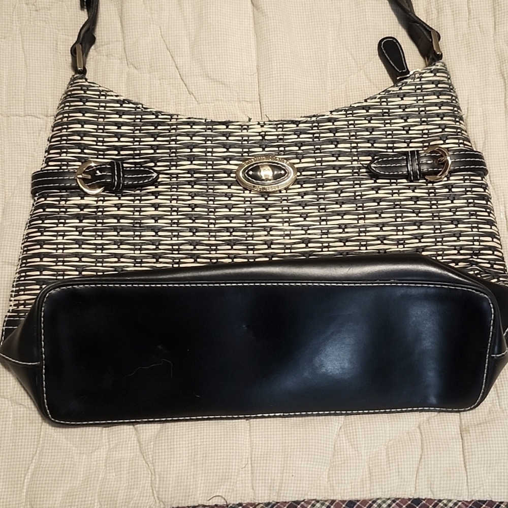 Vintage Etienne Aigner genuine purse. Black with wicker woven design.